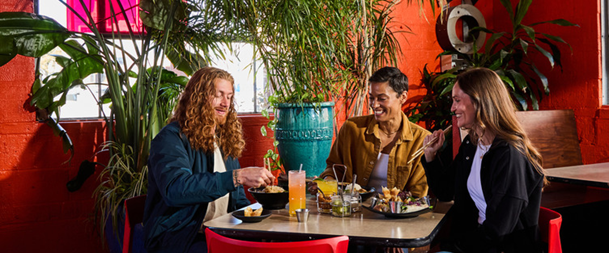 People enjoying traditional Thai food